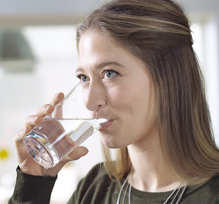 corporate office woman drinking water