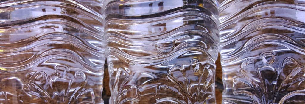 close-up of textured clear plastic bottles