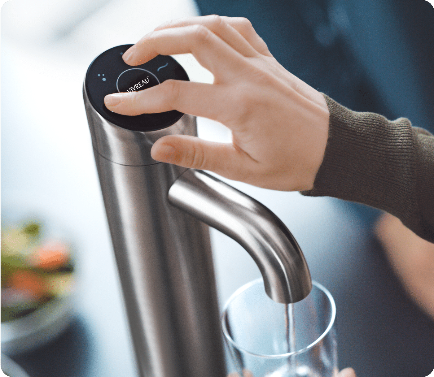 Close-up of water dispenser with digital interface