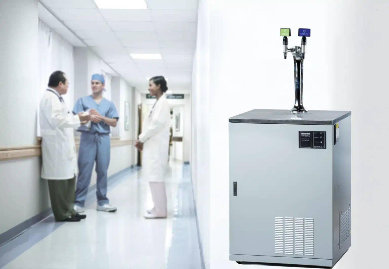 Vivreau water dispensing system in a hospital corridor with doctors in discussion