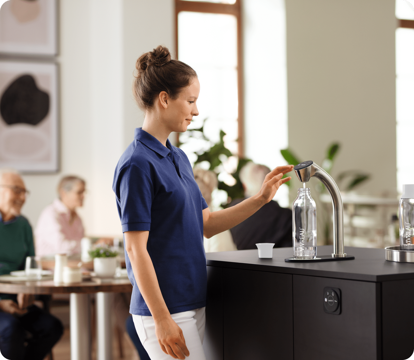 Close-up of water dispenser with digital interface