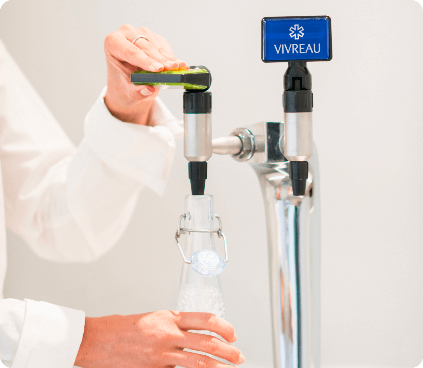 Close-up of water dispenser with digital interface