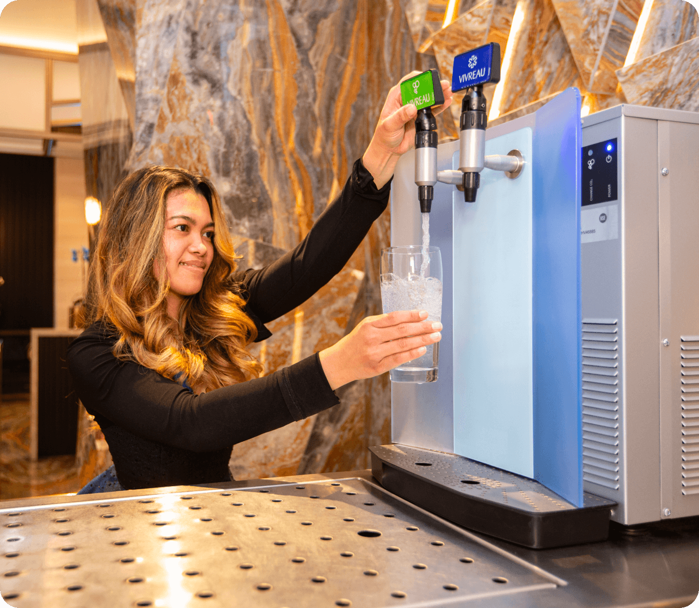 Close-up of water dispenser with digital interface