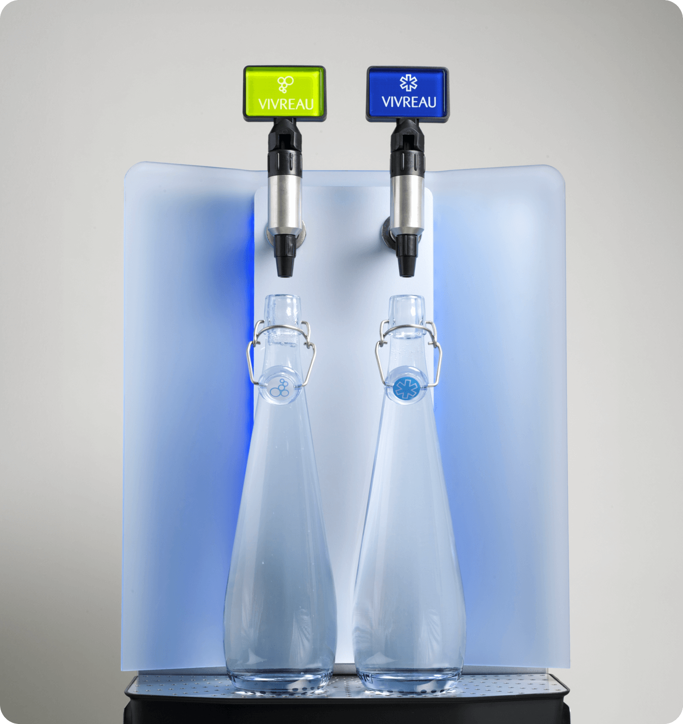 Person using water dispenser with glass